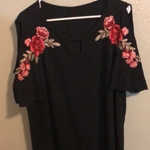 Black open shoulder top.
